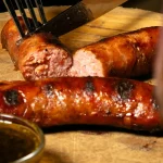 Chorizo criollo argentino a la brasa, entrante del restaurante La Madurada steakhouse en Barcelona, Horta y Sant Andreu